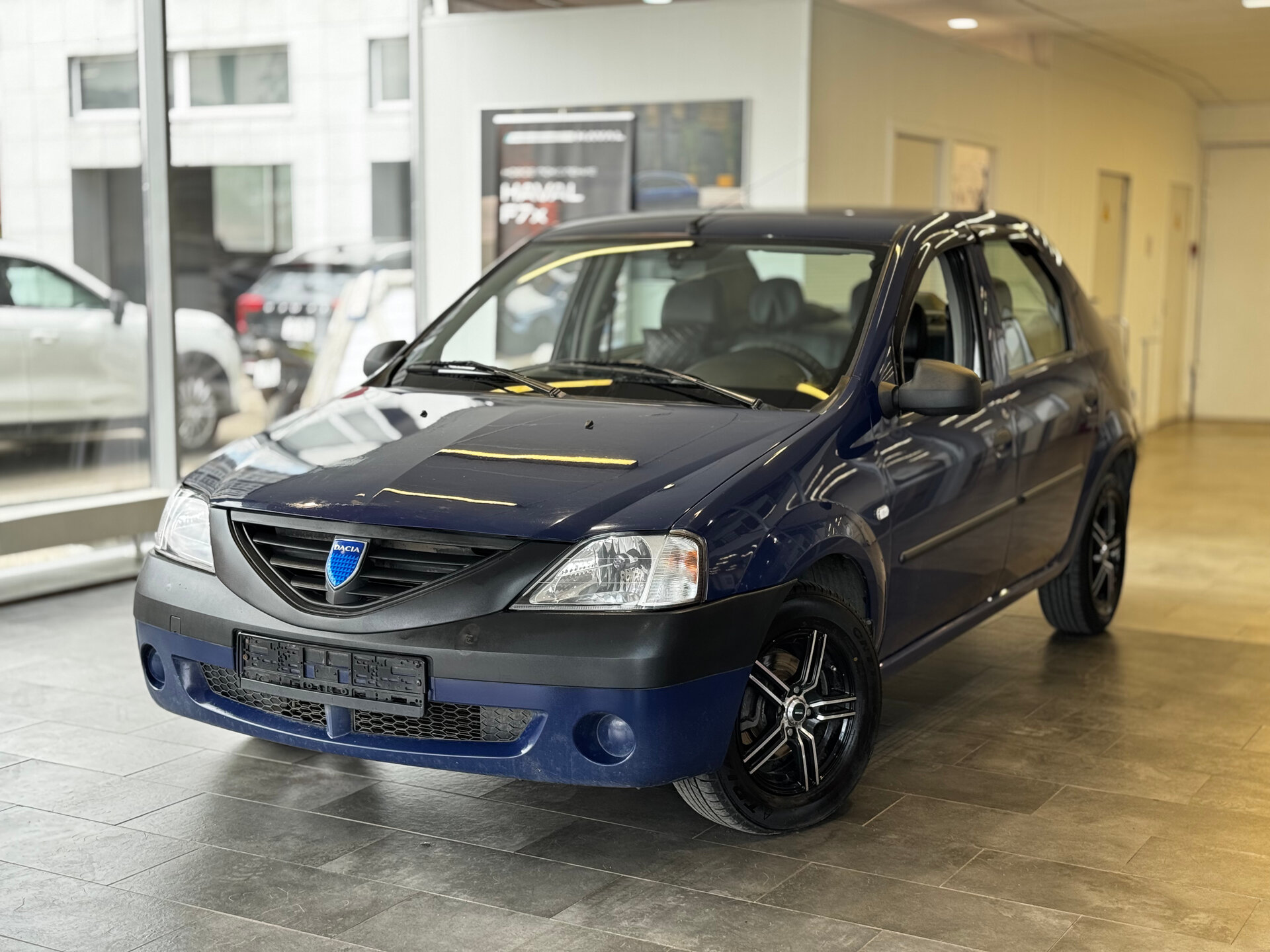 Dacia Logan 1.6 MT (87 л.с.), 2008