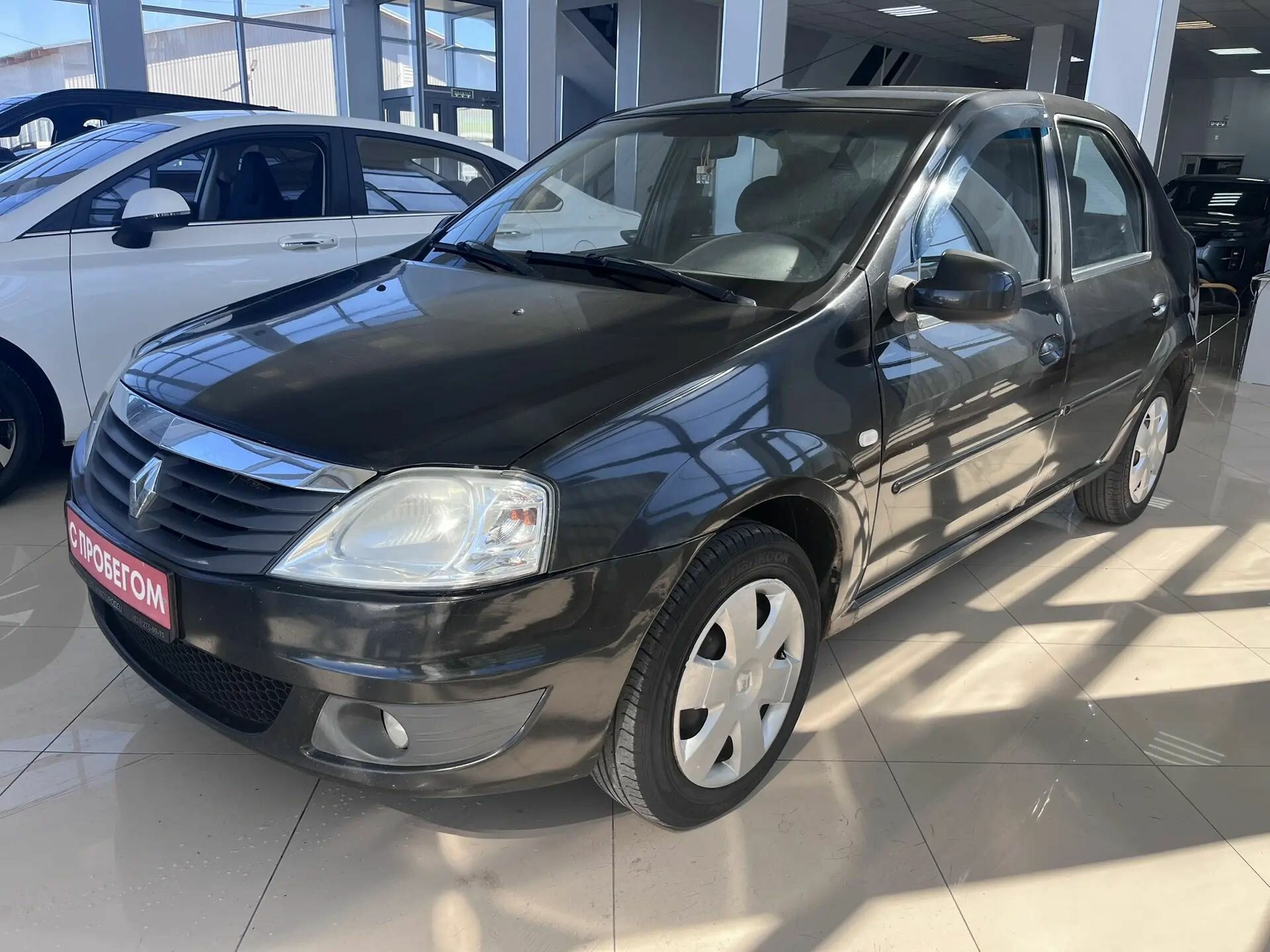 Renault Logan 1.6 MT (84 л.с.), 2010