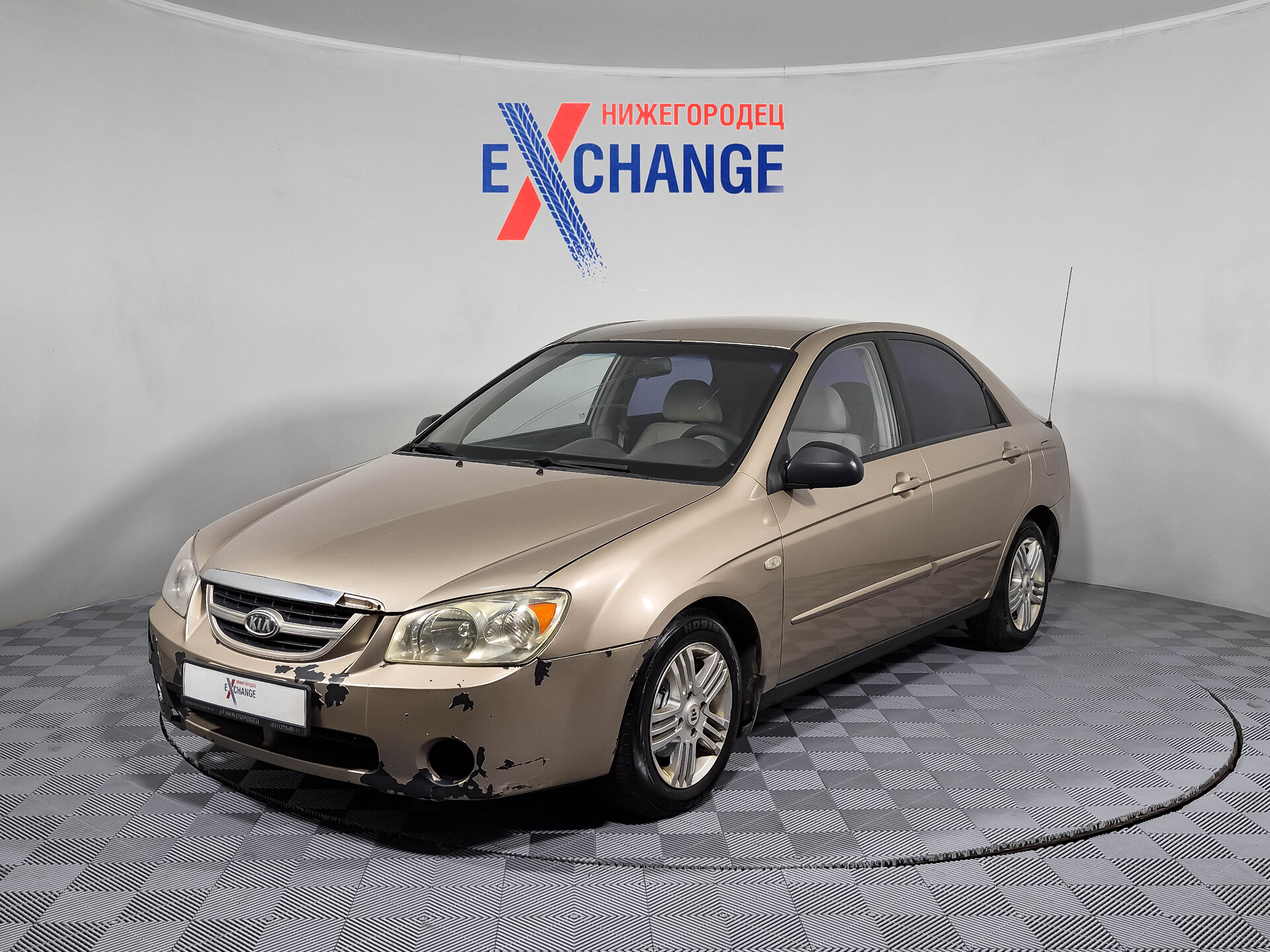 Kia Cerato 1.6 MT (105 л.с.), 2006