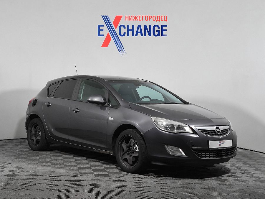 Opel Astra 1.6 MT (115 л.с.), 2012