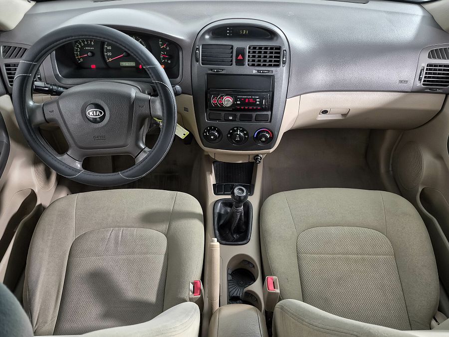 Kia Cerato 1.6 MT (105 л.с.), 2006