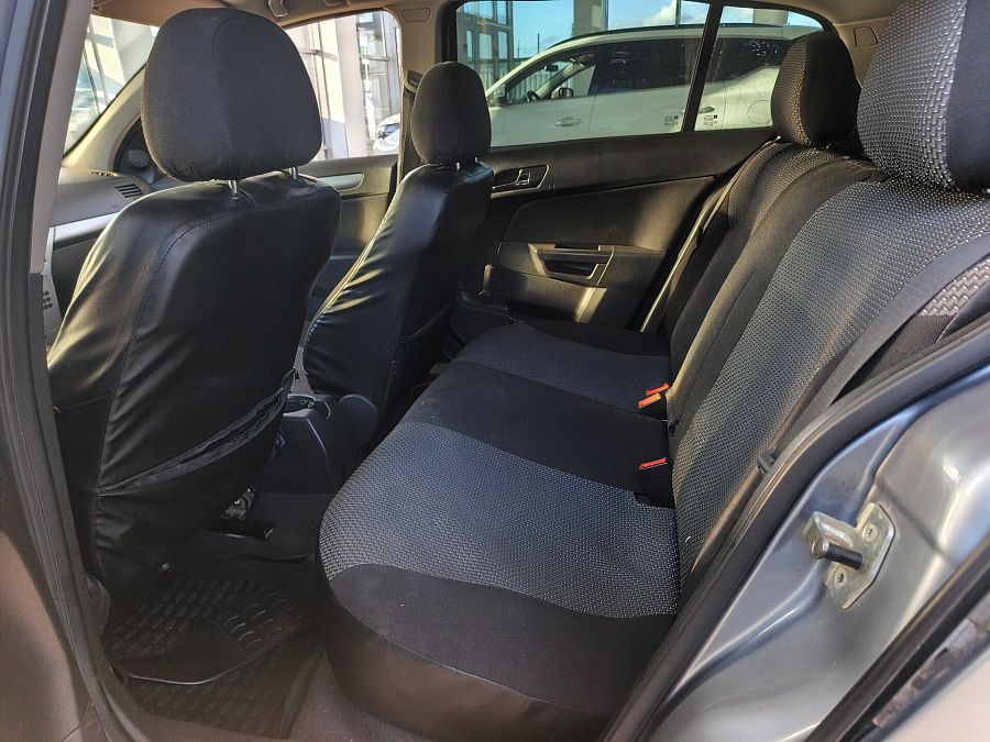 Opel Astra 1.6 MT (115 л.с.), 2011