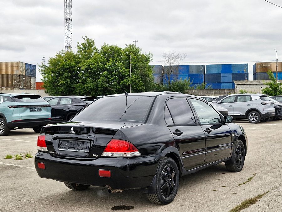 Mitsubishi Lancer 1.6 MT (98 л.с.), 2004