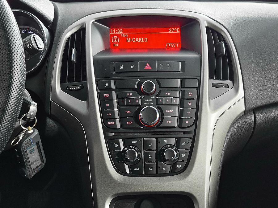 Opel Astra 1.6 MT (115 л.с.), 2012
