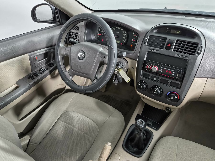 Kia Cerato 1.6 MT (105 л.с.), 2006