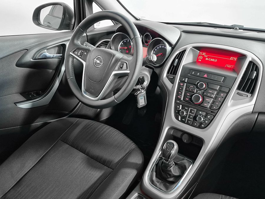 Opel Astra 1.6 MT (115 л.с.), 2012