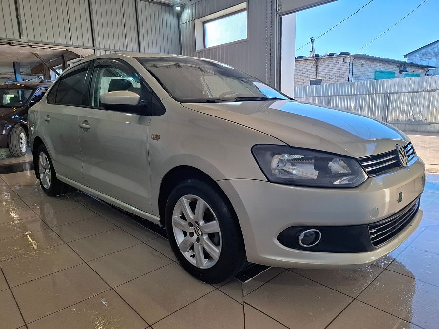 Volkswagen Polo 1.6 AT (105 л.с.), 2012