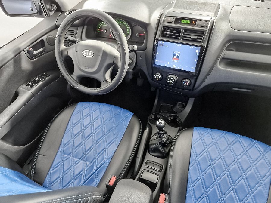 Kia Sportage 2.0 MT (141 л.с.), 2009