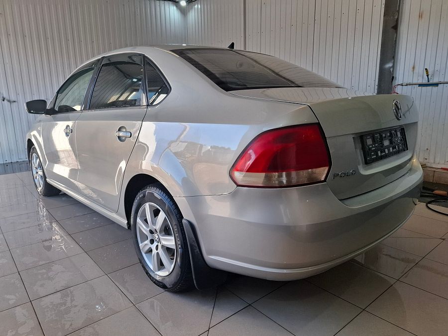 Volkswagen Polo 1.6 AT (105 л.с.), 2012