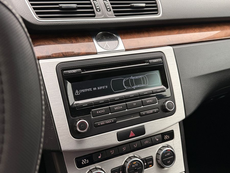 Volkswagen Passat 1.8 AMT (152 л.с.), 2012