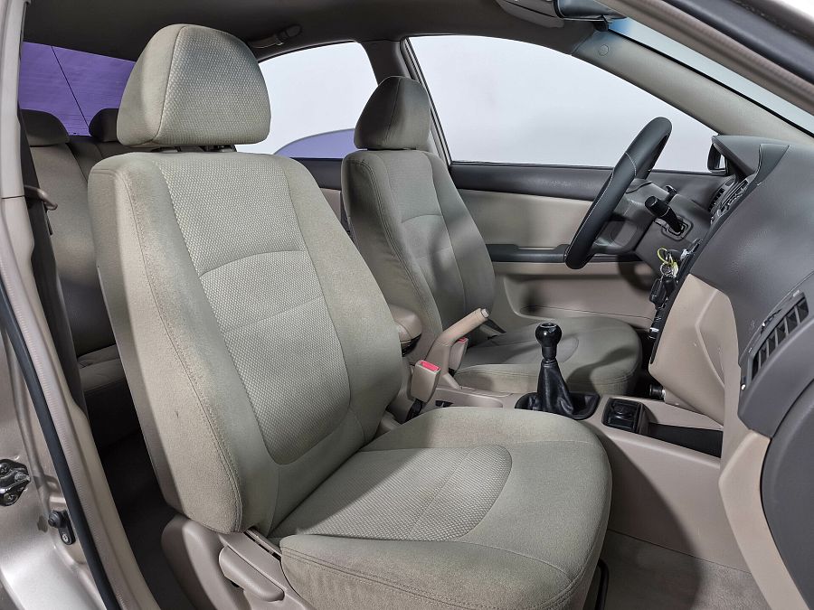 Kia Cerato 1.6 MT (105 л.с.), 2006