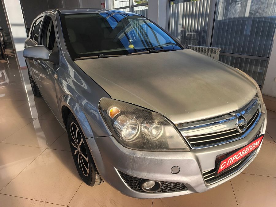 Opel Astra 1.6 MT (115 л.с.), 2011