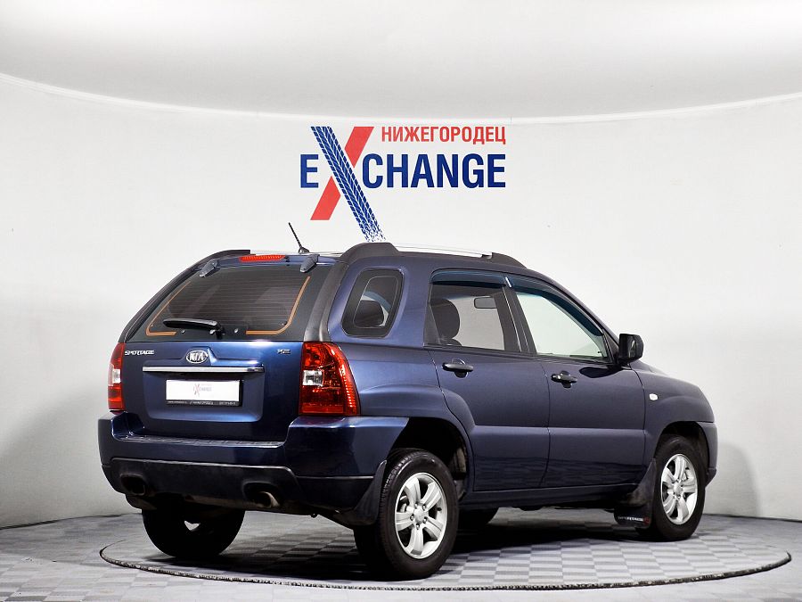 Kia Sportage 2.0 MT (141 л.с.), 2009