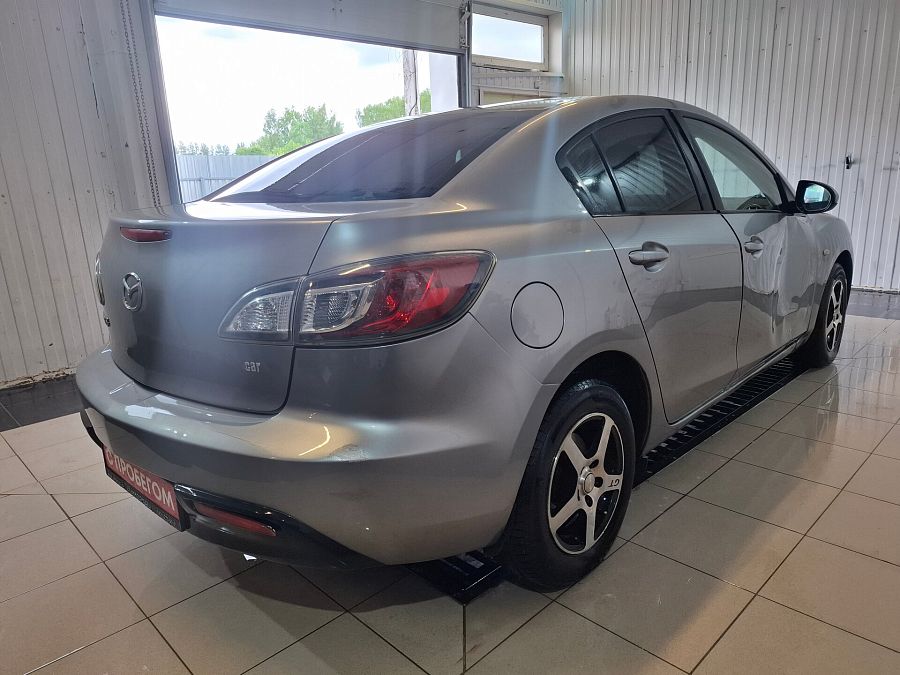 Mazda 3 1.6 MT (105 л.с.), 2010