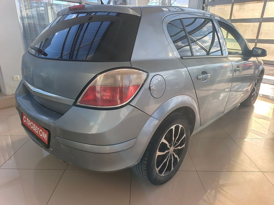 Opel Astra 1.6 MT (115 л.с.), 2011