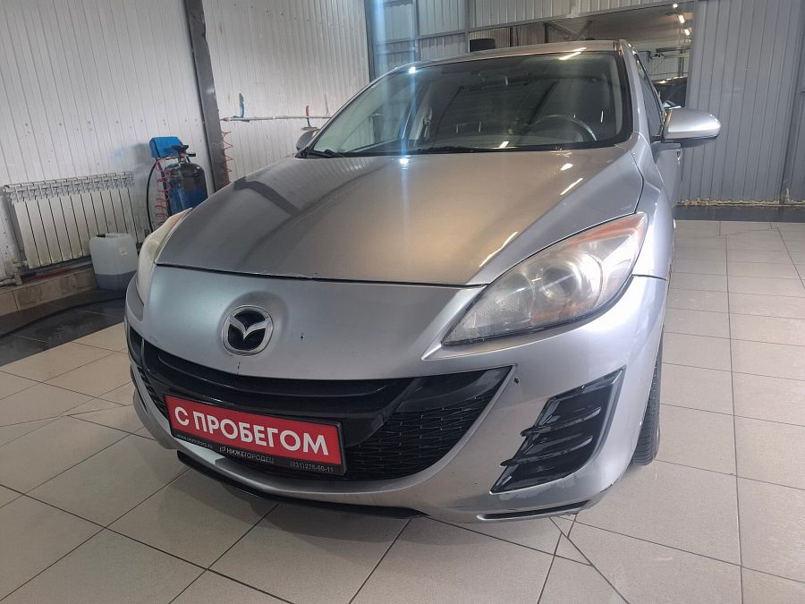 Mazda 3 1.6 MT (105 л.с.), 2010