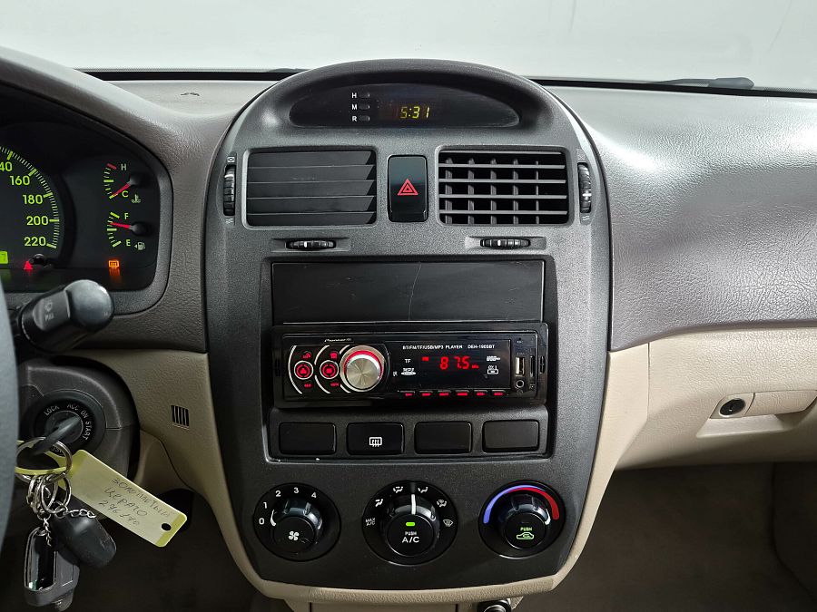 Kia Cerato 1.6 MT (105 л.с.), 2006