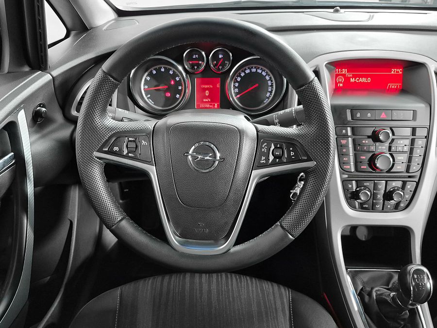 Opel Astra 1.6 MT (115 л.с.), 2012