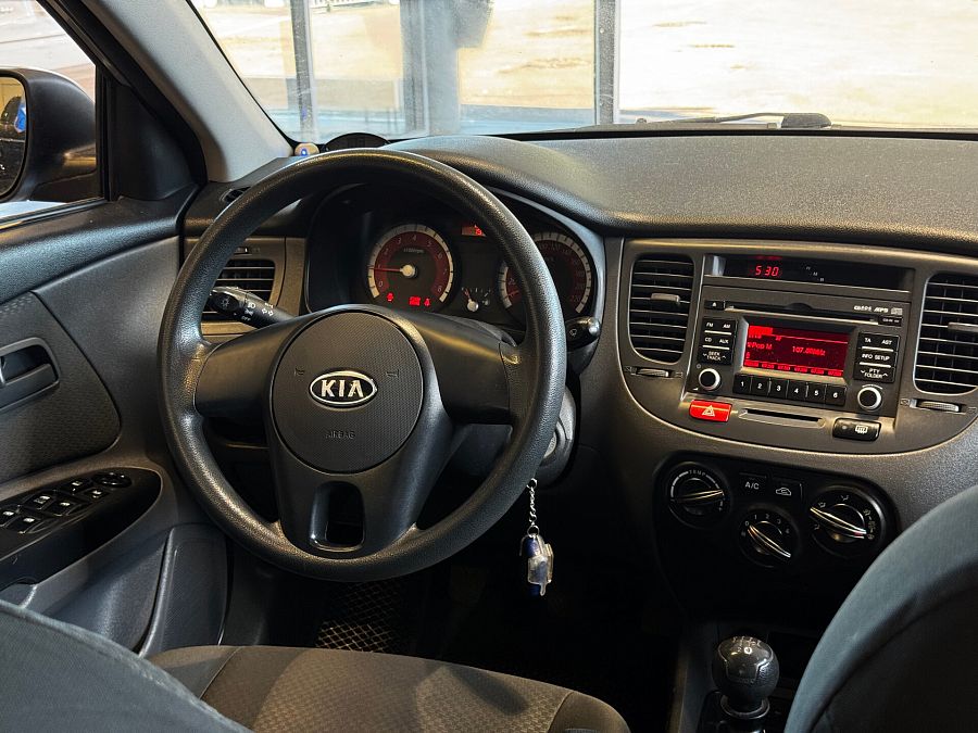 Kia Rio 1.4 MT (95 л.с.), 2011