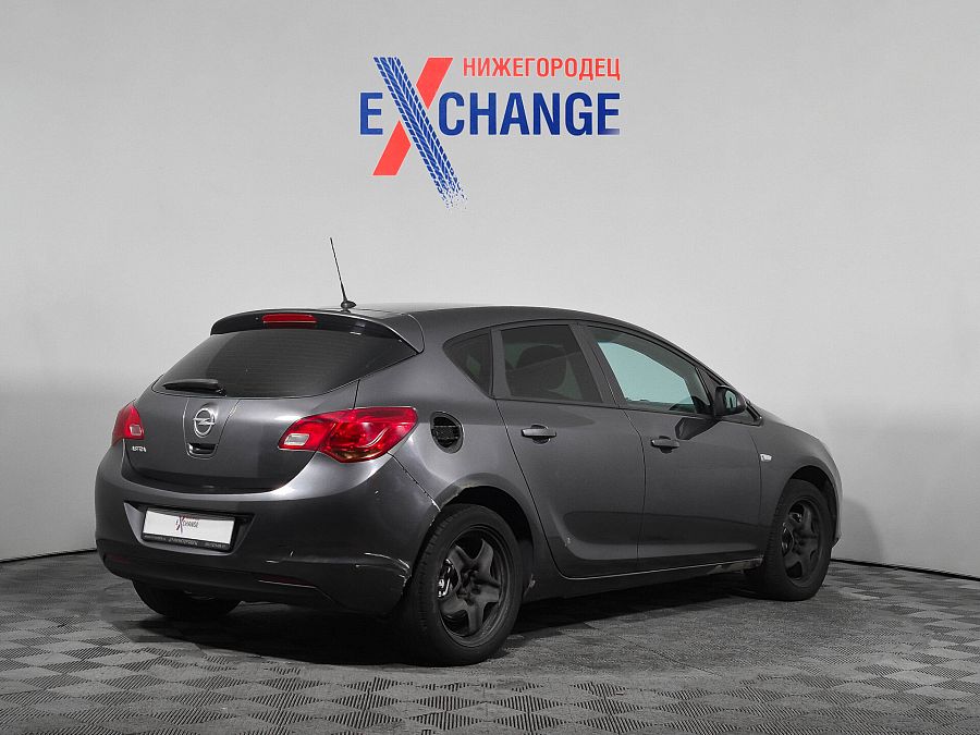 Opel Astra 1.6 MT (115 л.с.), 2012
