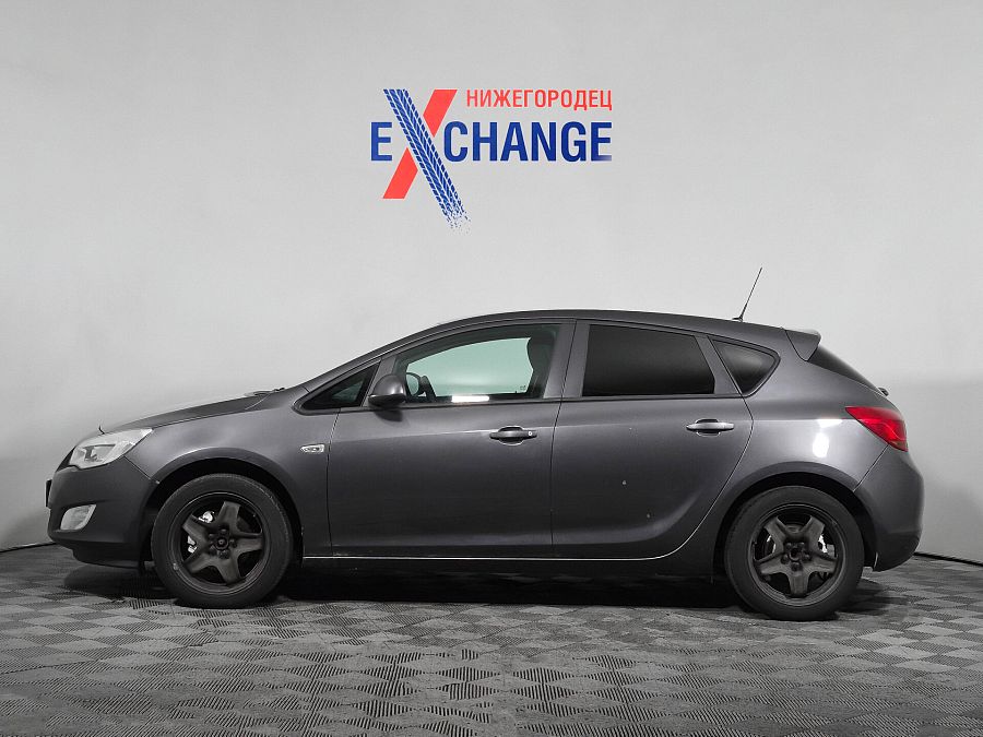 Opel Astra 1.6 MT (115 л.с.), 2012