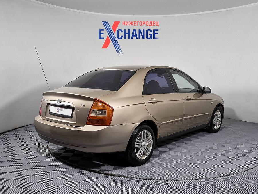 Kia Cerato 1.6 MT (105 л.с.), 2006
