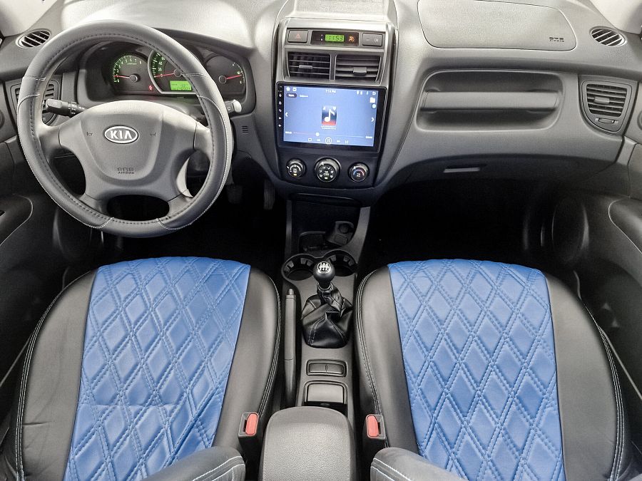 Kia Sportage 2.0 MT (141 л.с.), 2009