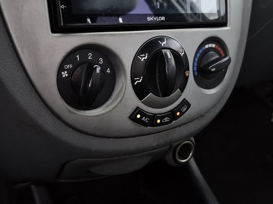 Suzuki Forenza 2.0 MT (127 л.с.), 2003