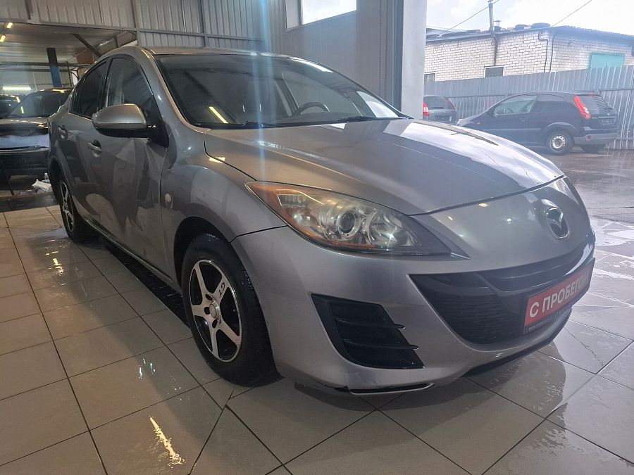 Mazda 3 1.6 MT (105 л.с.), 2010