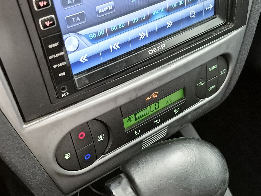 Ford Fusion 1.6 AT (101 л.с.), 2011