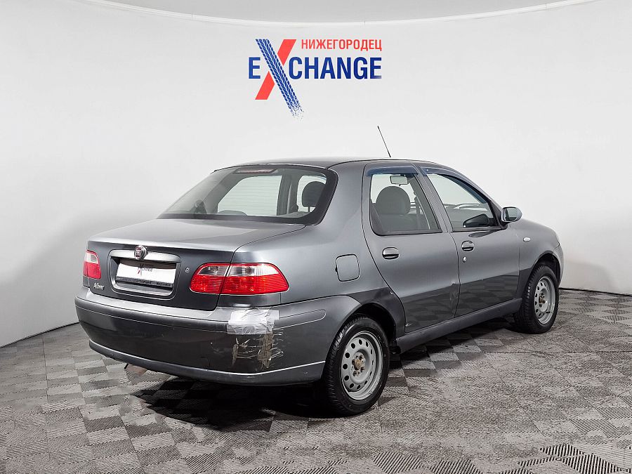 Fiat Albea 1.4 MT (77 л.с.), 2010 Fiat Albea 1.4 MT (77 л.с.), 2010