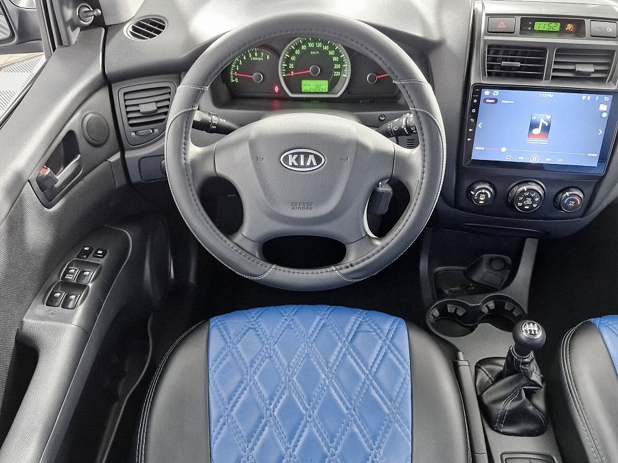 Kia Sportage 2.0 MT (141 л.с.), 2009