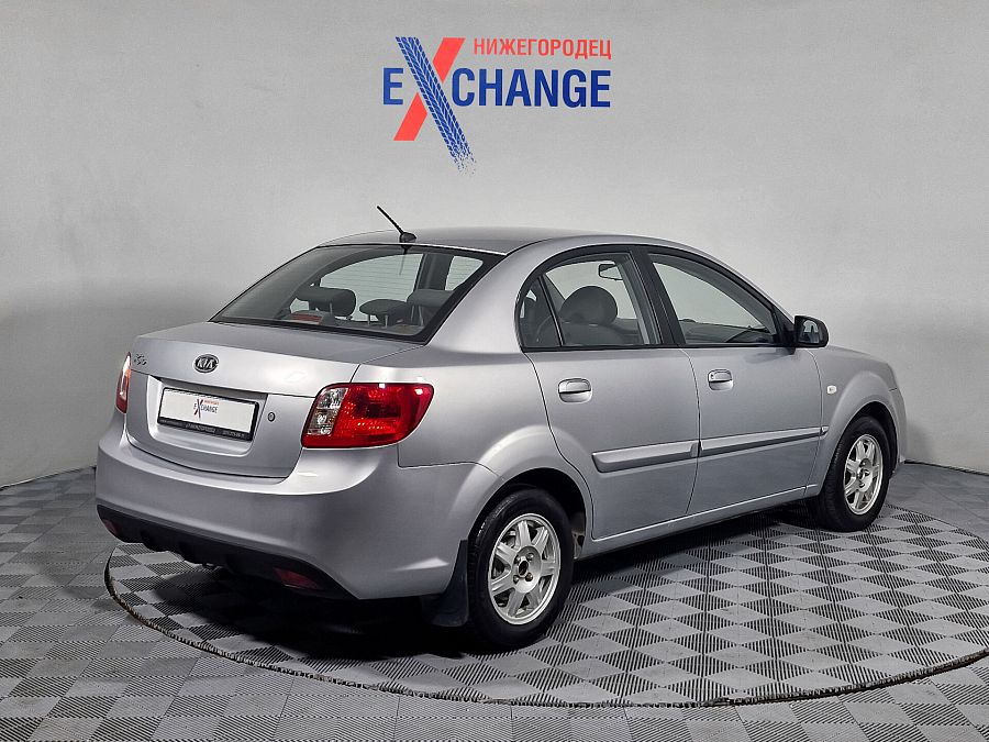 Kia Rio 1.4 AT (95 л.с.), 2011