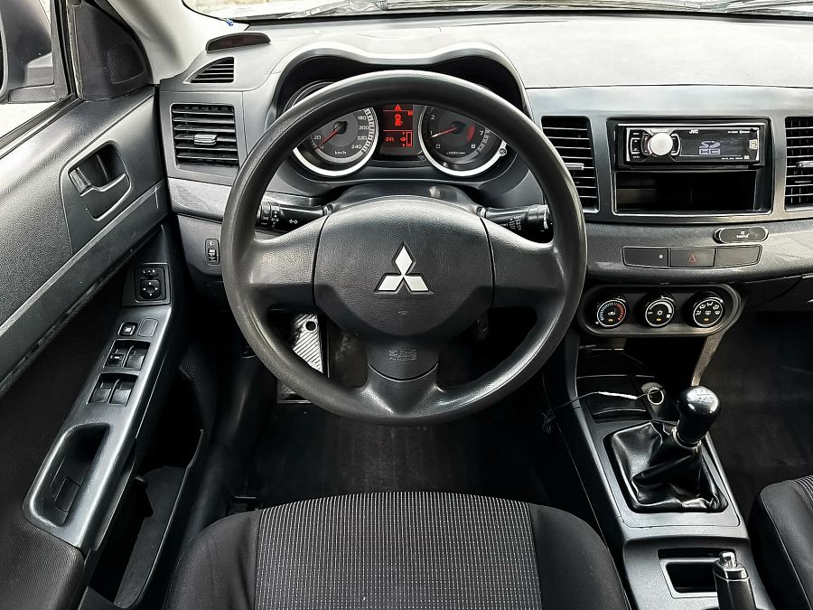Mitsubishi Lancer 1.5 MT (109 л.с.), 2009