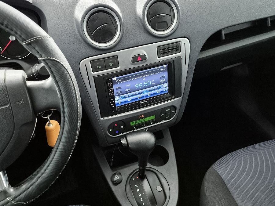 Ford Fusion 1.6 AT (101 л.с.), 2011
