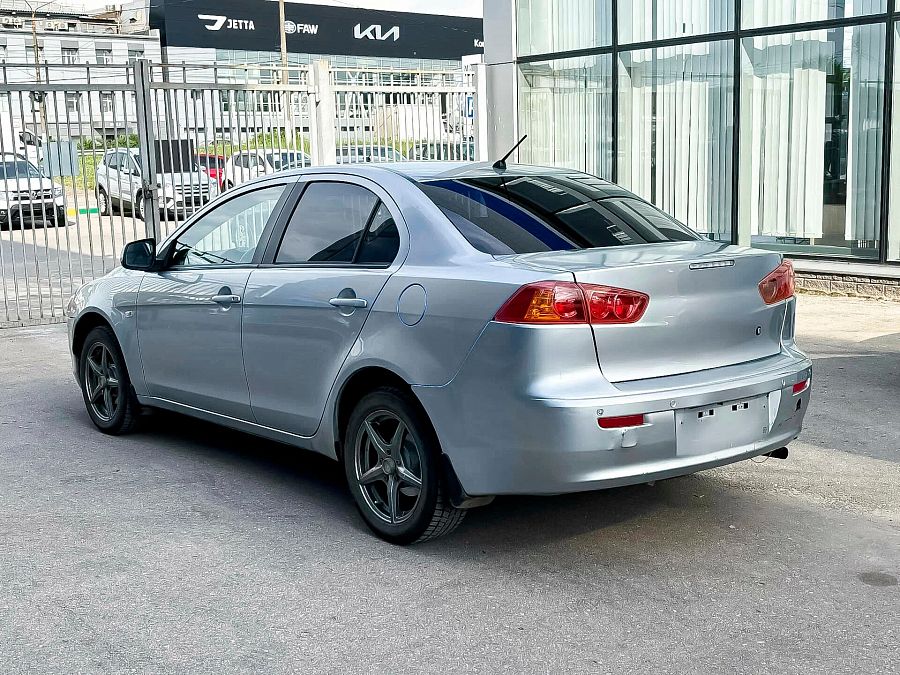 Mitsubishi Lancer 1.5 MT (109 л.с.), 2009